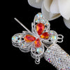 Silver crystal butterfly beads with orange and red gemstone accents