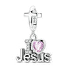 A sterling silver cross pendant with a heart charm bead and the name Jesus engraved on the bottom.
