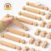 A collection of light wood wooden log cabin building kits and components.