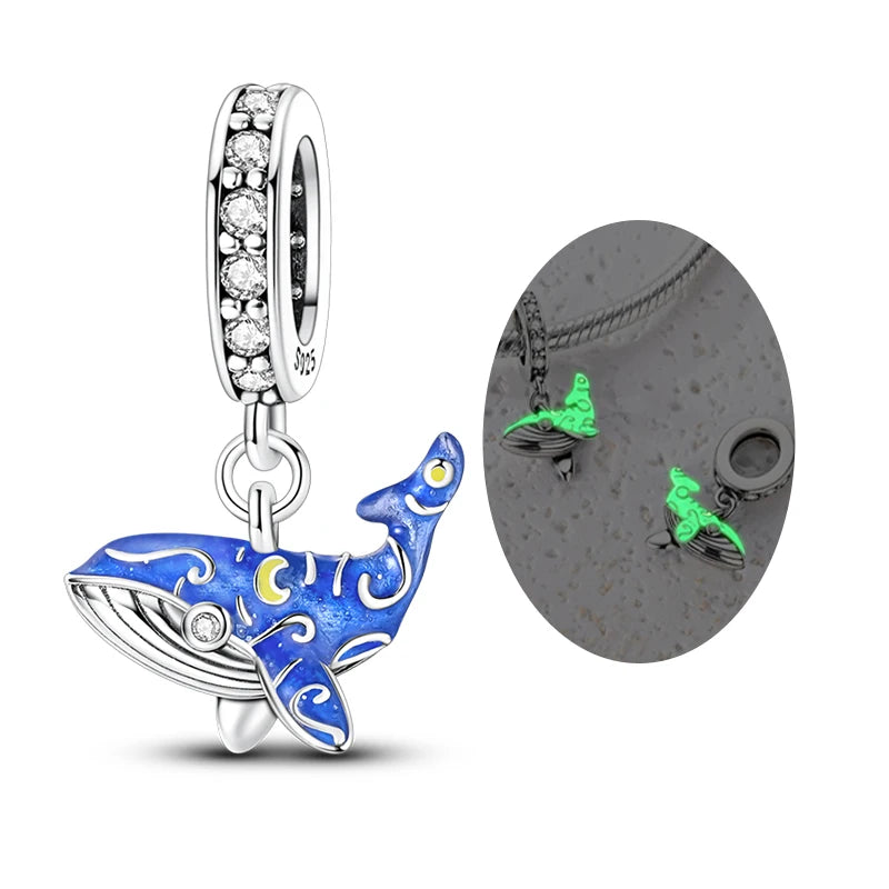 Sterling silver charm pendant set featuring starfish, sea turtle, and whale shark designs.