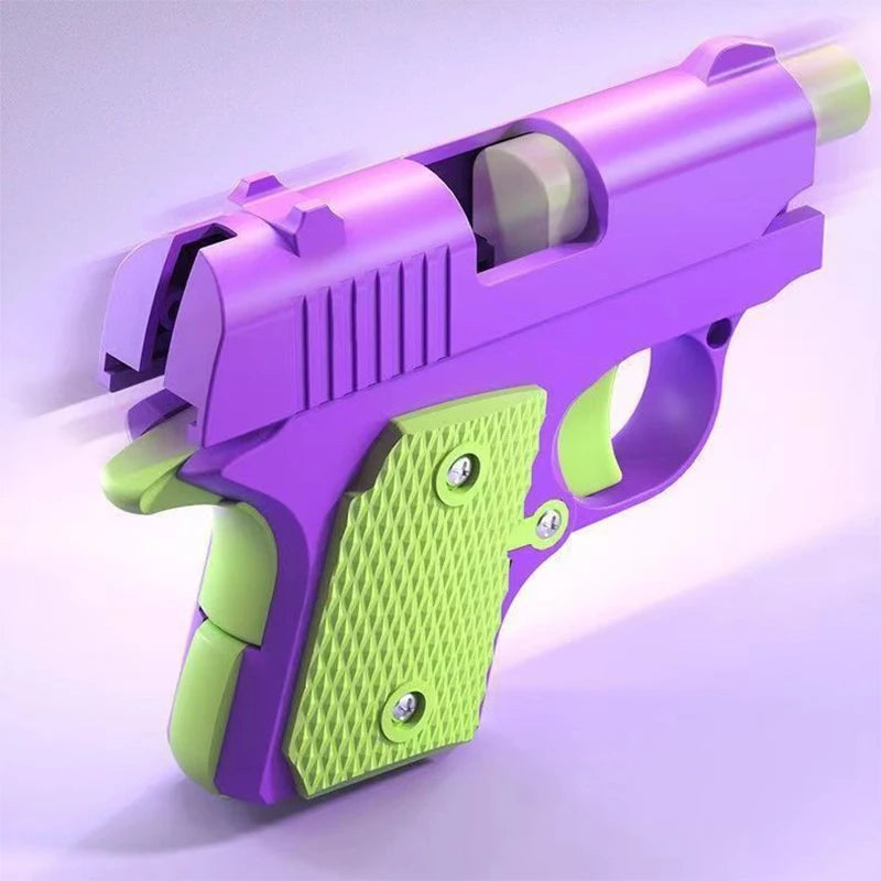 A purple and lime green fidget pistol toy with a slide action mechanism is shown from a side angle.