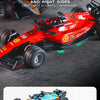 Simulated contour lights on a red Formula racing model car with green spotlights.