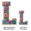 A large, textured floral letter L made of colorful fabric patches for DIY clothing and accessories.