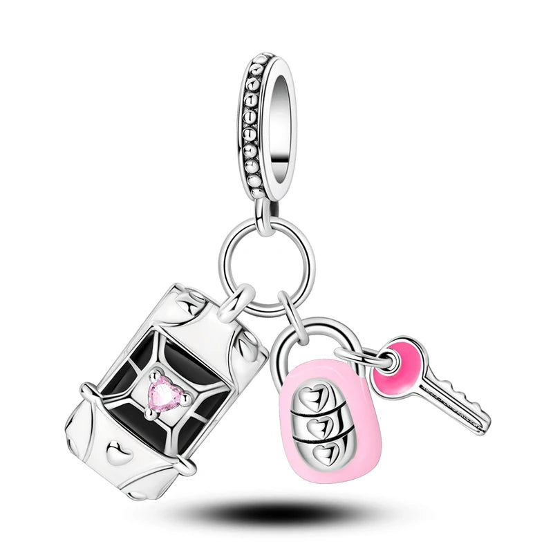 Sterling silver charm bead pendant featuring a car, key, and other charms.