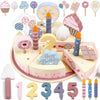 A wooden pretend play birthday cake set featuring various pink and purple themed cupcakes, toppers, and a number 2.