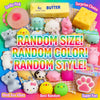 A collection of various squishy fidget toys and a block of butter presented in a colorful box.