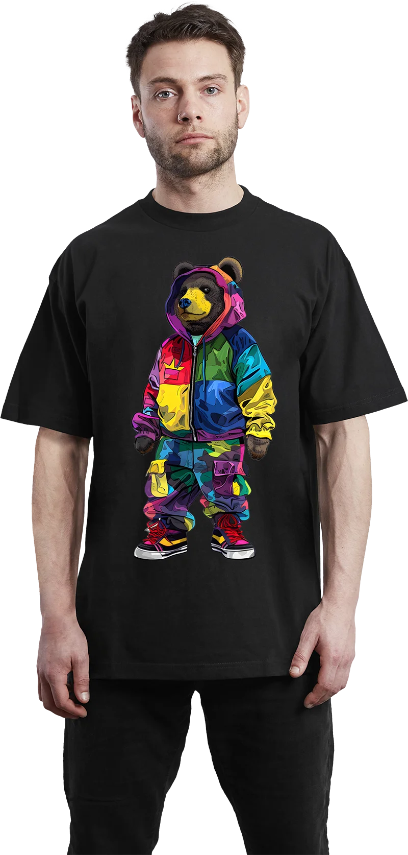 A man wearing a black t-shirt featuring a colorful graffiti bear design.