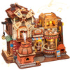 A wooden book nook kit featuring a bakery storefront with detailed architecture and lighting elements.