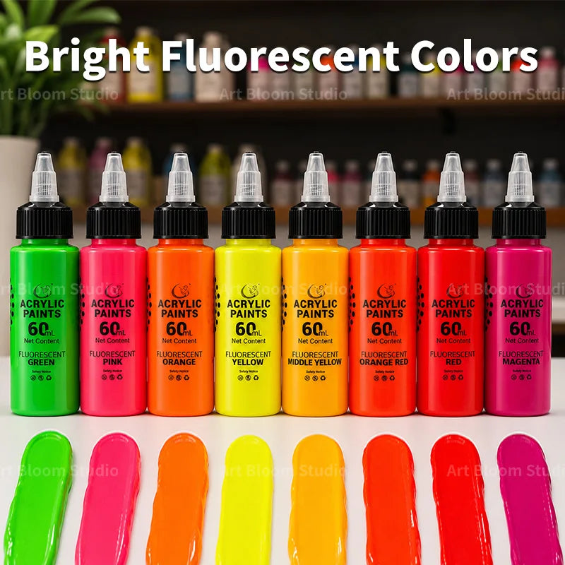 A collection of eight bright fluorescent acrylic paints in various colors like green, pink, orange, yellow, and red.