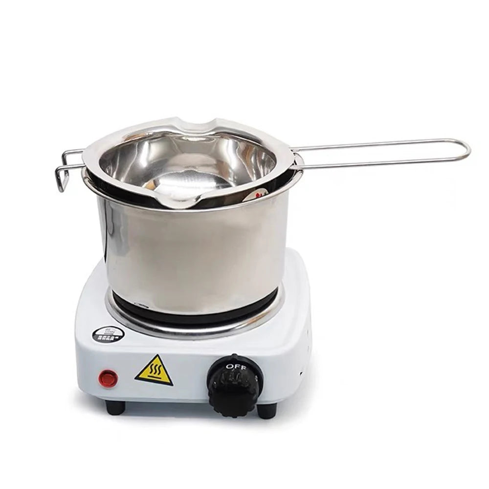 A complete candle making kit featuring a stainless steel melting pot, thermometer, and measuring cup on an electric heating b
