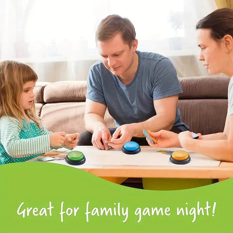 A father and daughter play with a 4-piece answer buzzer set for a family game night.