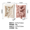 A silicone soap mold featuring a flower fairy design with an angel girl, rose, and butterfly motif.