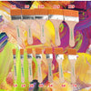A set of twelve numbered paint brushes in various shades of orange and beige wood handles