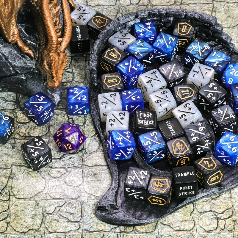 A collection of 63 dice in various colors and patterns is displayed in a dark bowl on a stone surface.
