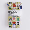 A yellow and pink fabric storage bag featuring various cartoon animal characters, including Miffy.