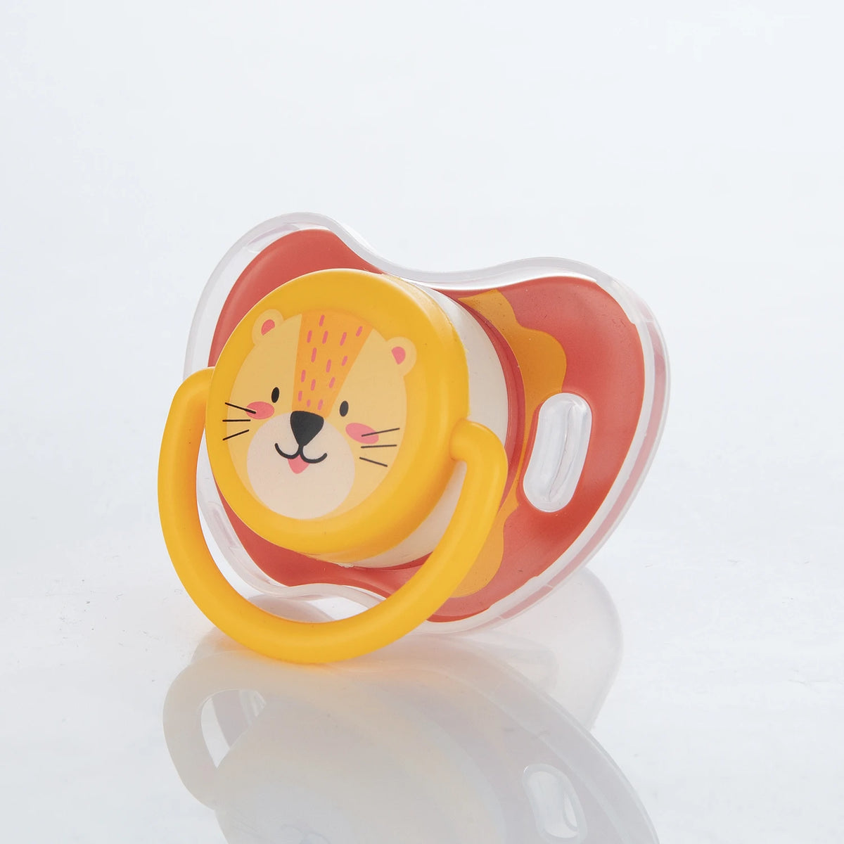 A baby pacifier set featuring a yellow lion design with orange and white silicone teats.