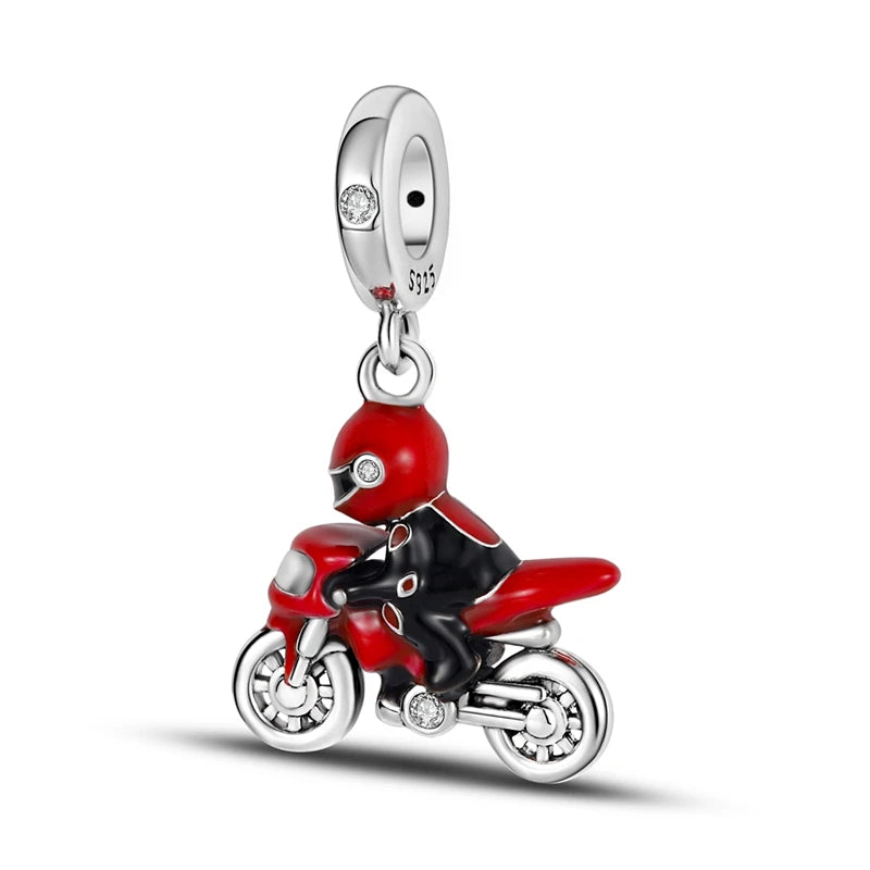Sterling silver charm bead pendant depicting a red and black motorcycle.