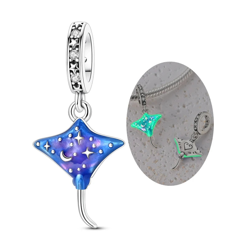 Sterling silver charm pendant set featuring starfish, sea turtle, and whale shark charms.