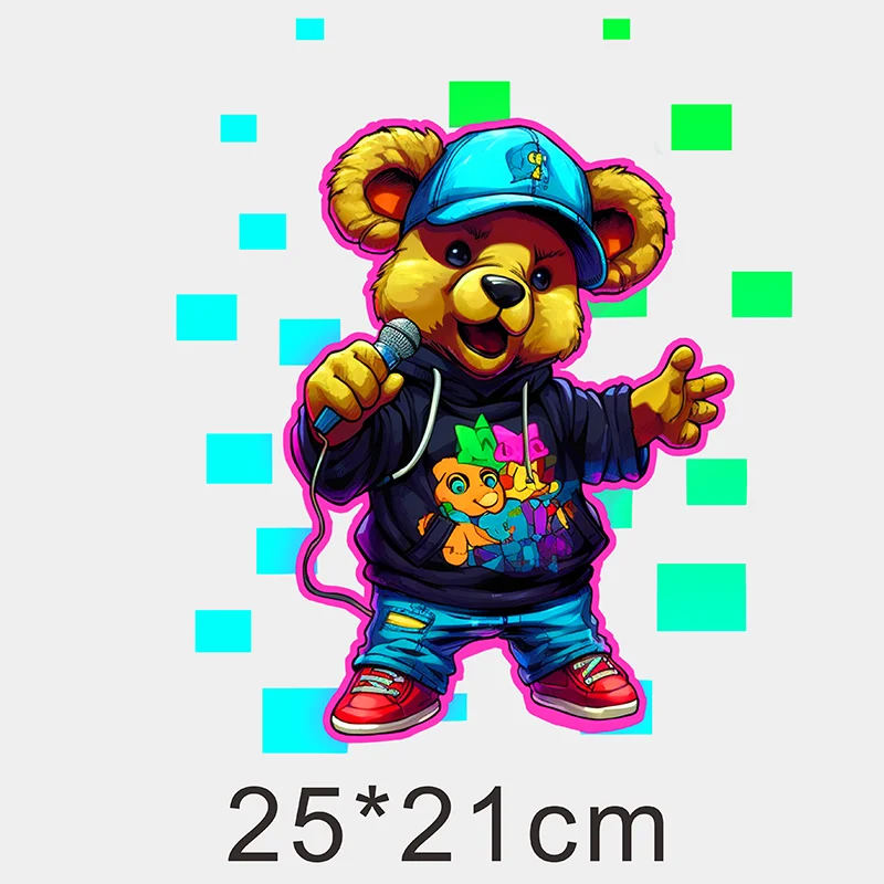 A cute, fluffy bear character wearing a blue baseball cap and hoodie, holding a microphone, surrounded by colorful square sha
