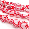 Red heart lampwork glass beads arranged in strands for jewelry making