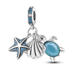 Sterling silver charm pendant set featuring a starfish, sea turtle, and whale shark.