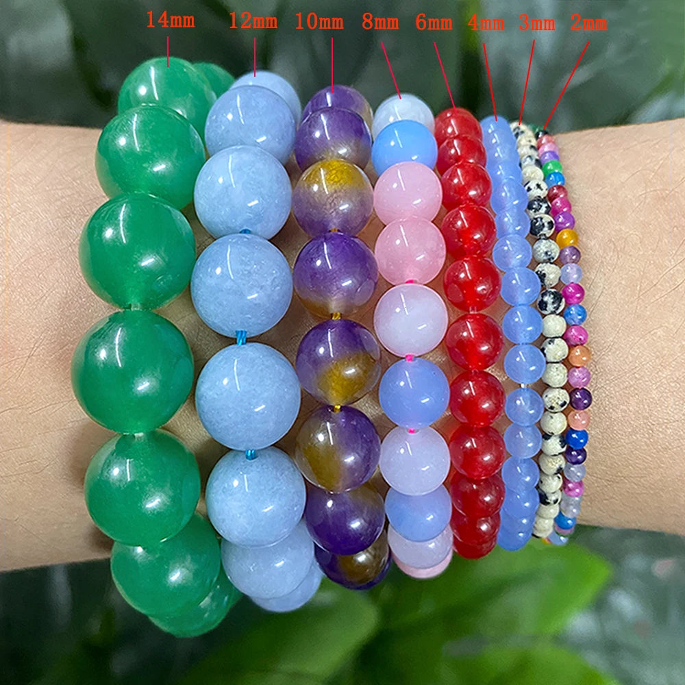A bracelet featuring a gradient of natural light blue and purple chalcedony beads for jewelry making.