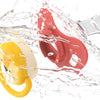 A baby pacifier set with six interchangeable silicone teats is shown being washed under running water.