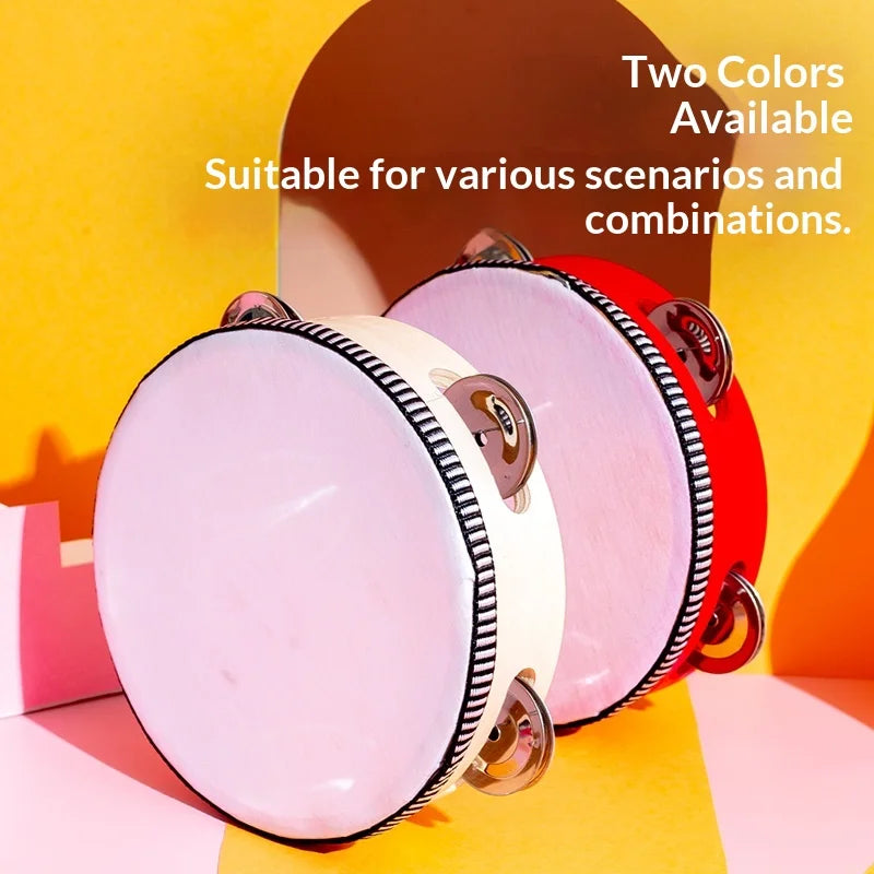 Two colored hand-held tambourines with metal jingles displayed against a bright background.