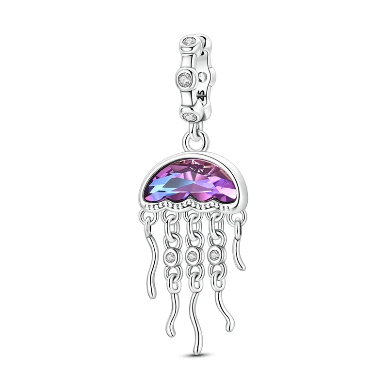 Sterling silver charm pendant set featuring starfish, sea turtle, and whale shark charms.