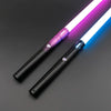 A lightsaber toy with a black metal handle and a blade emitting purple and blue light.