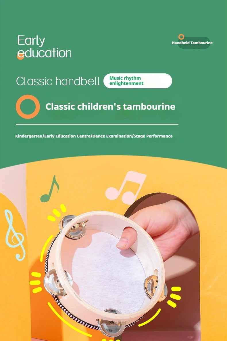 A hand is holding a white tambourine with metal jingles, demonstrating a classic children's instrument.