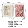 A pink silicone soap mold shaped like a flower with rose and butterfly designs, shown next to its measurement details.