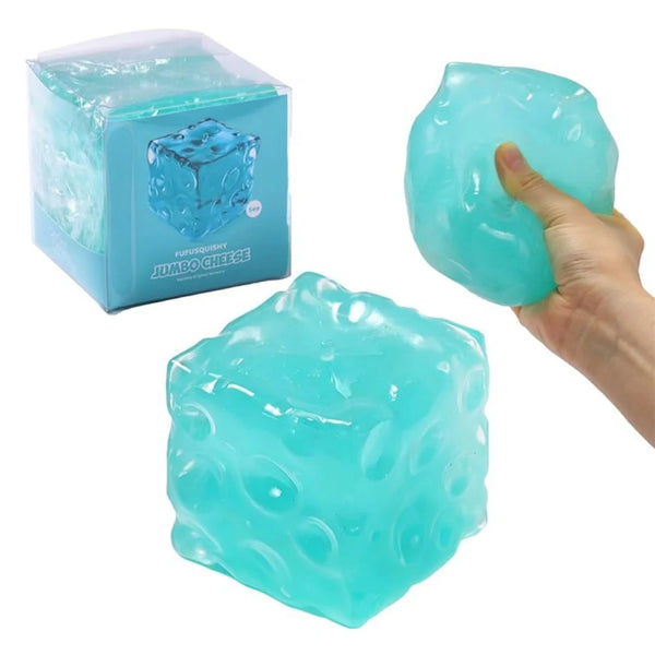 A hand is squeezing a translucent light blue squishy cheese block stress relief toy.