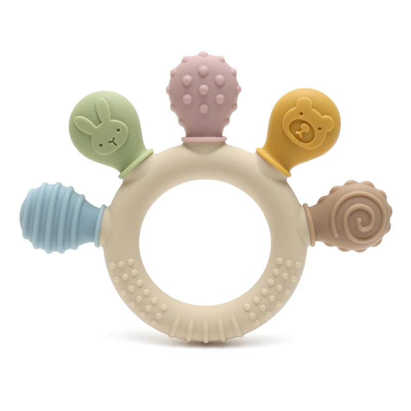 A silicone baby teether with various colored chew beads shaped like animals and a central ring.