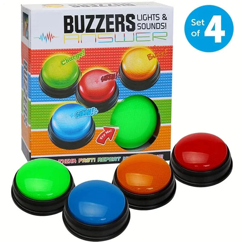 A box containing a set of four colored answer buzzers for kids, including red, yellow, green, and blue buttons.