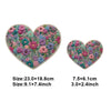 A heart-shaped floral patch featuring various pink, purple, and green flowers for DIY clothing and accessories.