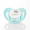 A clear silicone baby pacifier with a crown design and storage case, featuring the name Sofia.