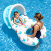 A woman is sitting in a blue inflatable pool lounger with a sun canopy and backrest in clear blue water.