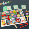 A wooden BBQ playset with matching game featuring various food items and tools for toddlers.