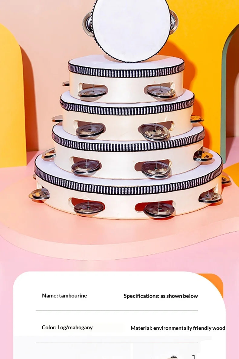 A stack of white log/mahogany tambourines with metal jingles displayed against a colorful background.