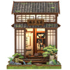 A traditional Japanese wooden book nook kit featuring detailed architecture and interior scenes with LED lighting.