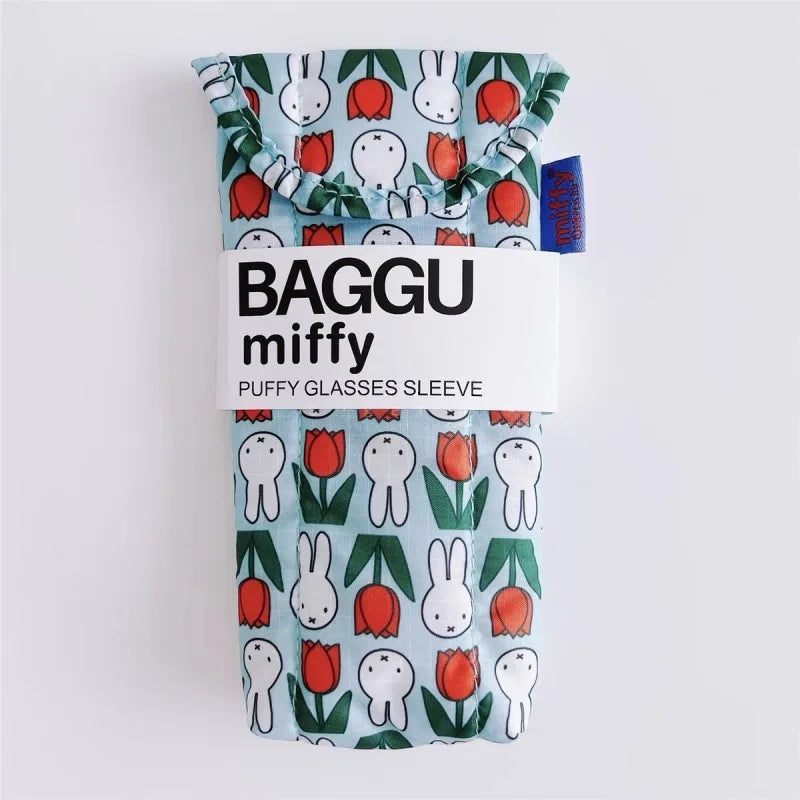 A fabric storage bag featuring a pattern of Miffy rabbits and red tulips.