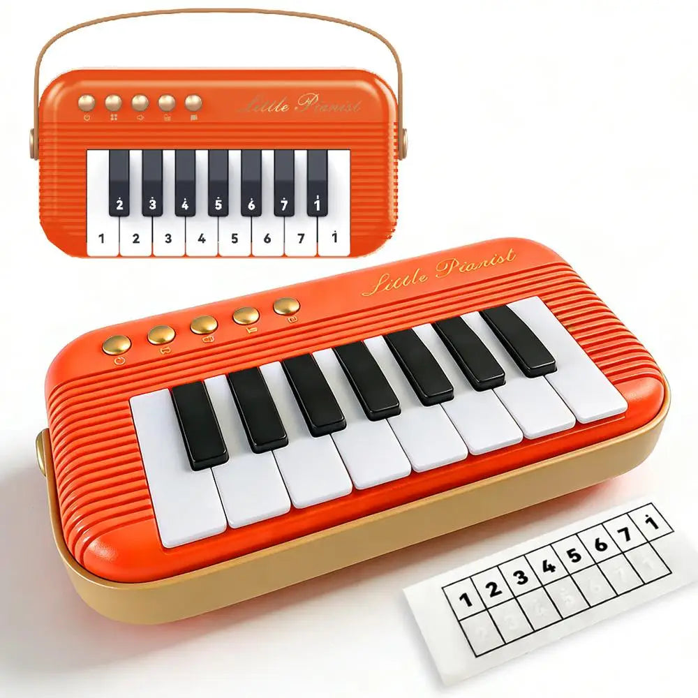 An orange mini piano keyboard for kids with black and white keys and a corresponding sheet music grid.