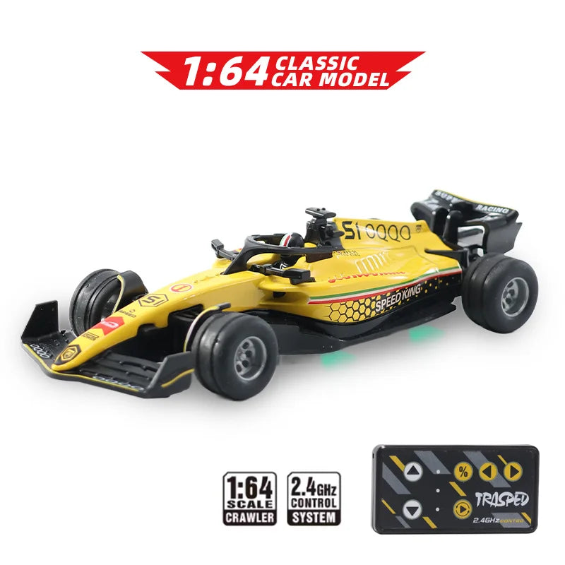 A yellow 1:64 classic car model racing RC drift car with a black body and wheels.