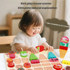 A child plays with a wooden ice cream set featuring various flavors and shapes for pretend play.