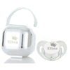 Silver personalized baby pacifier with a crown design and storage case