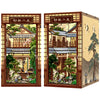 A pair of wooden book nooks featuring traditional Japanese architecture and nature scenes with integrated LED lighting.