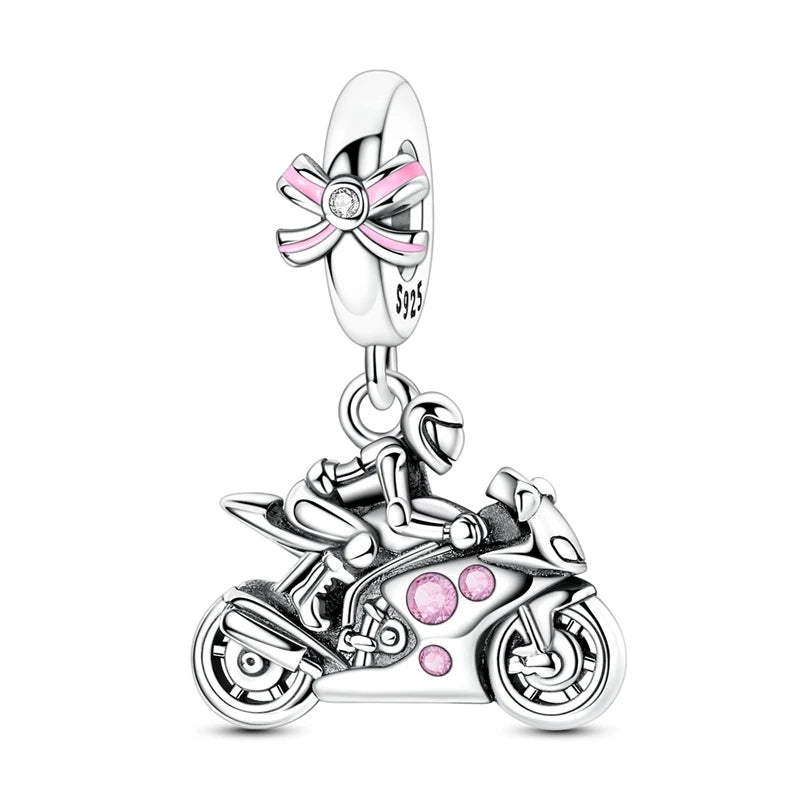 Sterling silver charm bead pendant featuring a motorcycle, key, and other charms.