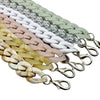 A close-up of multiple acrylic bag chain straps in various pastel colors, including white, pink, and green.