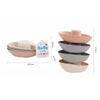 A set of five boat-shaped stacking cups for toddlers in various pastel colors.